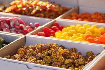 Candies. Variety of candy on a market. Various of colorful sugar candies . Selective focus. 