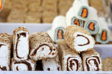 Turkish delight. Lokum. Sweet candies with nuts. turkish delight for dessert. Cezerye or lokum. Turkish candies and sweets, tasty background texture, healthy teeth. Candy texture.  Calories and diet. 