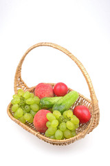 Fruit in the basket isolated on a white background