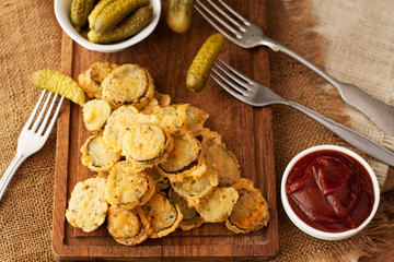 Battered fried pickles with ketchup