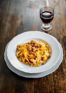 Tagliatelle with rag&ugrave;. Tipycal homemade fresh pasta with meat  sauce.