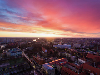 Aerial: Vibrant sunrise over Wroclaw at frosty morning