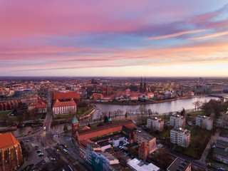 Aerial: Vibrant sunrise over Wroclaw at frosty morning