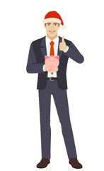 Businessman holding a piggy bank and showing thumb up