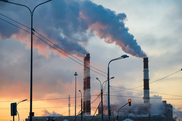 thick smoke belching from factory chimneys