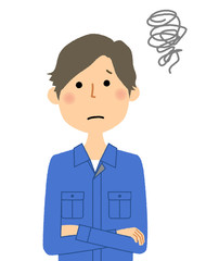 作業服の男性　困る