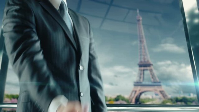 Businessman handshaking at important meeting in Paris Eiffel