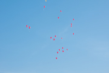 flying red balloons helium sky
