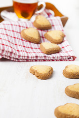 Heart-shaped cookies and tea for St. Valentine's Day.