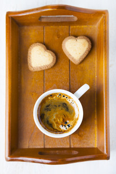 Heart-shaped biscuits and coffee