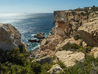 Fototapeta na wymiar Malta cliffs in mediterranean sea