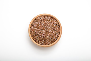 close up of flax seeds on white background. Healthy food concept for preventing heart diseases and overweight.