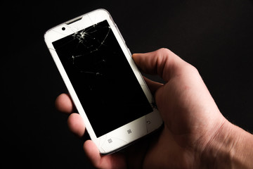 a phone with a broken display