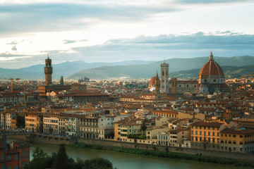 Fototapeta na wymiar Florence, river embankment of Arno and Cathedral of Santa Maria del Fiore, Italy