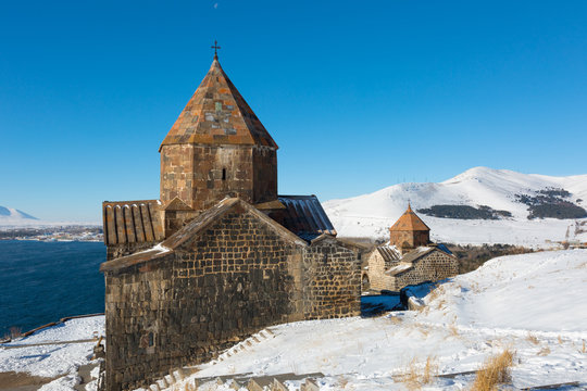 Scenic view of an old Sevanavank church in Sevan, on sunny winter day blue sky. Armenia