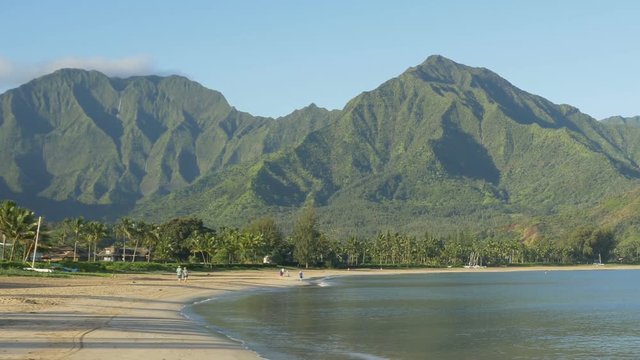 Zooming out view of Hanalei Bay, Kauaii, Hawaii, during early morning.