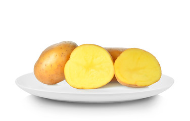 Naklejka na ściany i meble Potato in white plate on white background