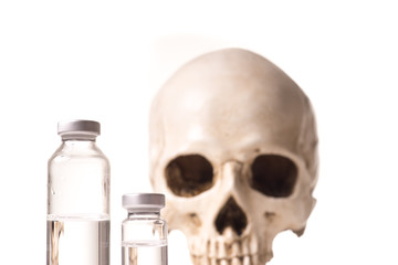 Medical vials and skull