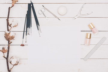 top view of manicure tools on wooden table