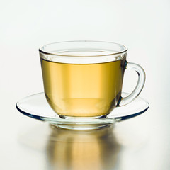 Glass cup of green tea. Close up. Isolated.
