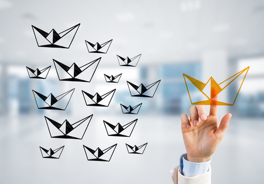 Concept of leadership and teamworking with many icons and one of them standing out