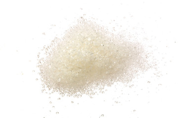 Heap of granulated sugar isolated on white background. Top view. Flat lay