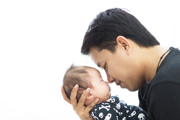 Happy  Asian Father Look with love. newborn  daughter, dad see baby. Dad with baby girl, love. New born child looking on dad.