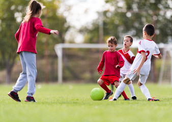 Young children players football match on soccer field © Dusan Kostic