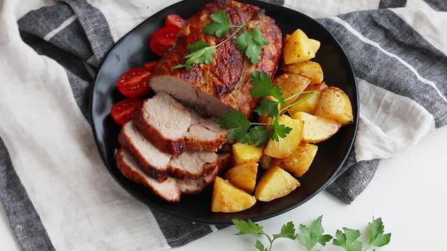 Roasted pork with potatoes. Top view