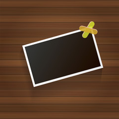 vintage photo frame with shadow isolated on wooden wall background. Vector Photo realistic Mockups with empty space for photo.