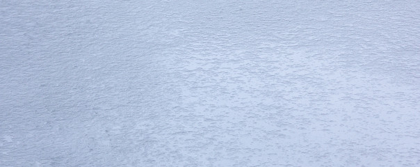 Obraz premium Frozen water, ice texture, winter background.