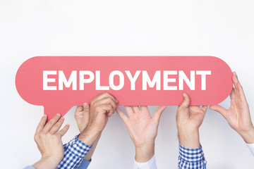 Group of people holding the EMPLOYMENT written speech bubble