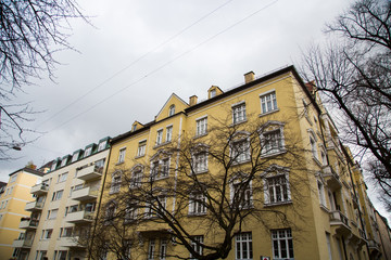 Row of houses with old building houses in Schwabing, colorful facade