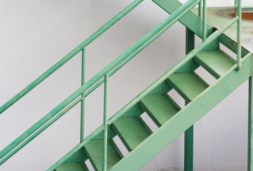 green fire exit stair, outdoor metal stair structure