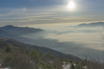 Panoramic view with the sunrise from the snowy mountain of Kaimaktsalan (Voras) in Macedonia Greece
