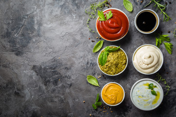 Selection of different sauces in bowls