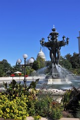 Fototapeta premium The fountain is a symbol of success and abundance./ The Bartholdi fountain is located near greenhouses of the Botanical garden. 