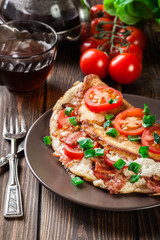 Omelette with bacon and tomatoes