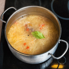 soup from stewed sour cabbage in stewpan