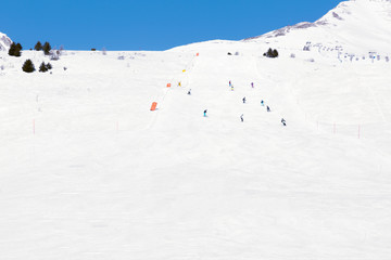 Slopes, lifts and skiers at ski resort in Italy, Alps