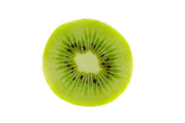 Kiwi fruit, Fresh green kiwi fruit slice close up partially isolated on white background with...