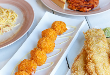 cheese balls on white dish