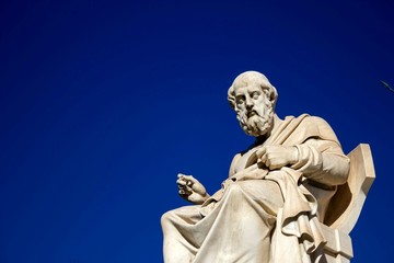 Fototapeta premium Statue of the ancient Greek philosopher Plato in front of the Academy of Athens, Greece.