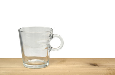 Empty coffee cup on wooden table