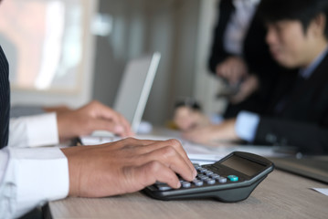 financial inspector analyze accounting plan report. businessman working with new startup project. internal auditor audit performance revenue. business meeting at office.