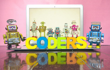 the word CODERS  with wooden letters