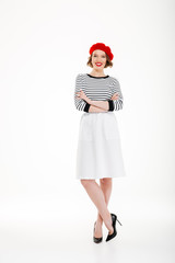 Cheerful lady looking camera and holding hands folded isolated