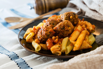 tasty penne with Meat ball and tomato sauce