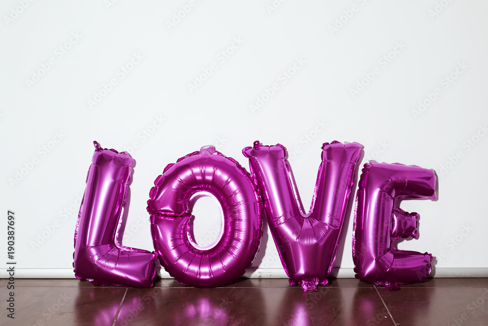 Wall mural letter-shaped balloons forming the word love