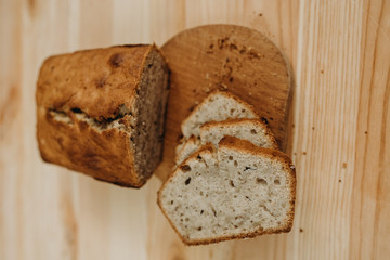 Time to eat. Close-up of sliced banana bread on a desk in the kitchen. Tasty food. Delicious eats. Healthy life